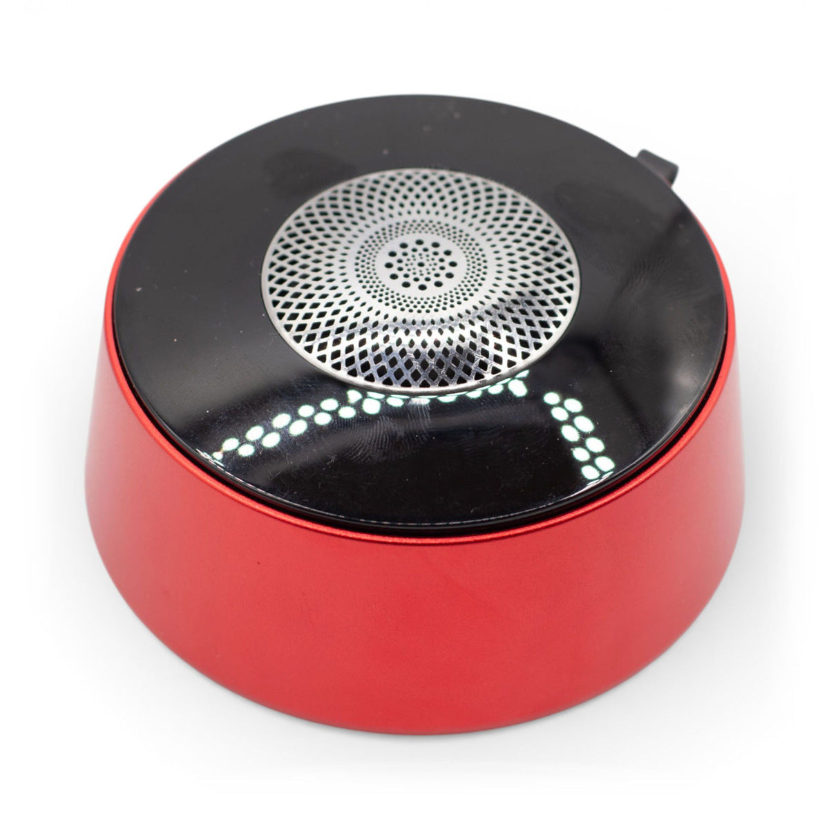 Red Mandala mini speaker glowing with vibrant mandala LED light effect, compact circular design, playing music with rich red finish and subtle carry loop visible