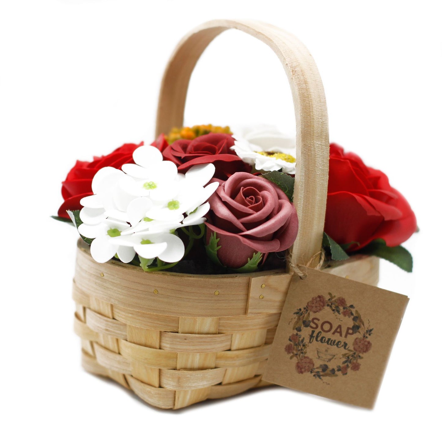 Medium red soap flower bouquet with lifelike roses and blooms beautifully arranged in natural wicker basket, tied with ribbon, presented as luxury bath gift on soft white background