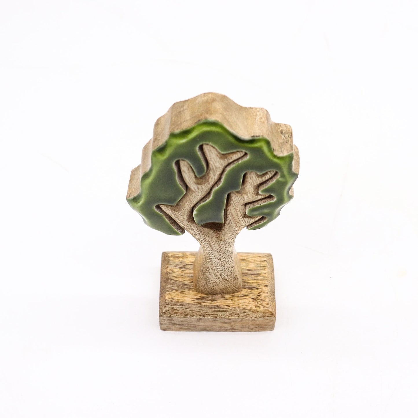 20 cm tall 3D mango wood Christmas tree with deep green enamel branches on wooden base, styled on shelf with fairy lights and pine cones