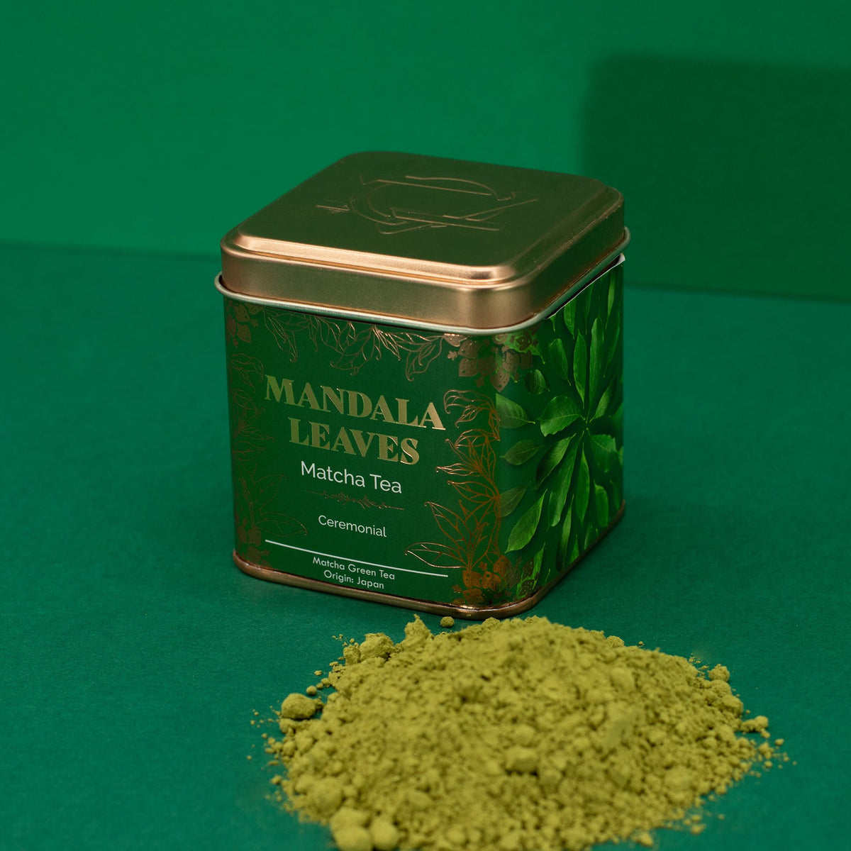Mandala Leaves Matcha Tea can with green tea powder on a green background