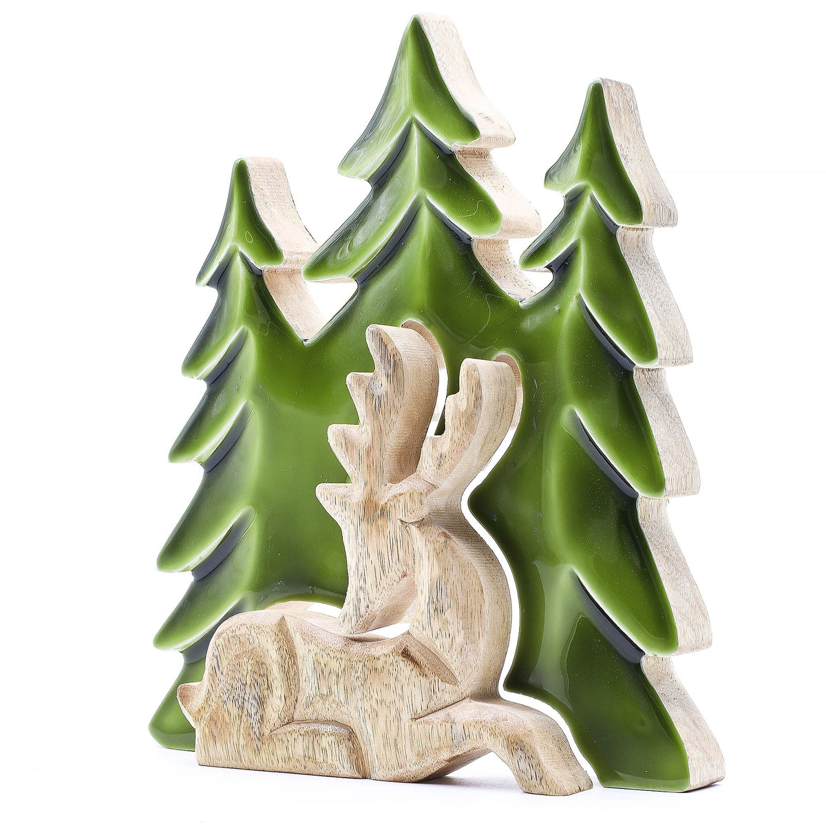 Decorative ceramic deer and trees on a white background