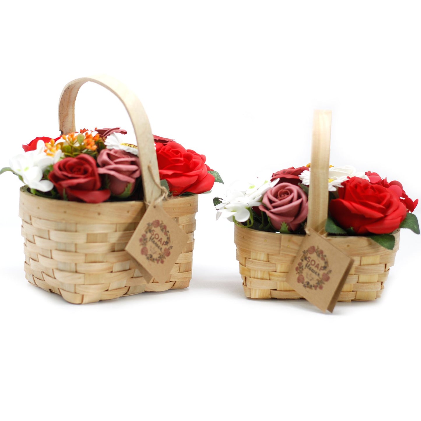 Two wicker baskets with soap flowers on a white background