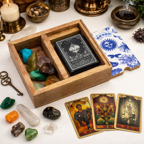 Two Section Tarot Box with Card Holder featuring ceramic triple moon symbol on lid, open to show storage compartments and upright card display slot with tarot cards, crystals, and candles on a white surface