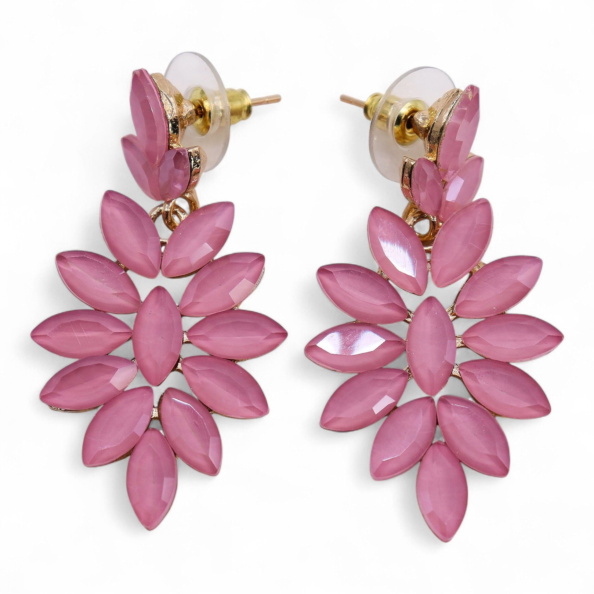 Pink floral earrings on a white background