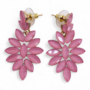 Pink floral earrings on a white background