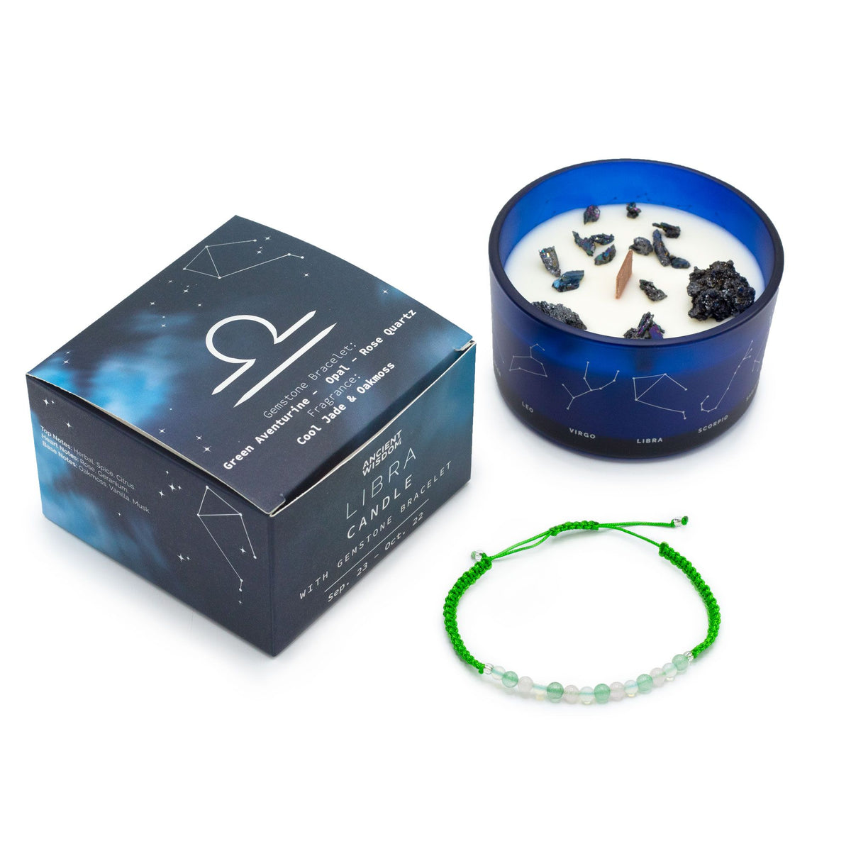 Soft jade-green Libra zodiac candle burning beside delicate rose quartz, opal & aventurine bracelet, styled with scales and Libra constellation card
