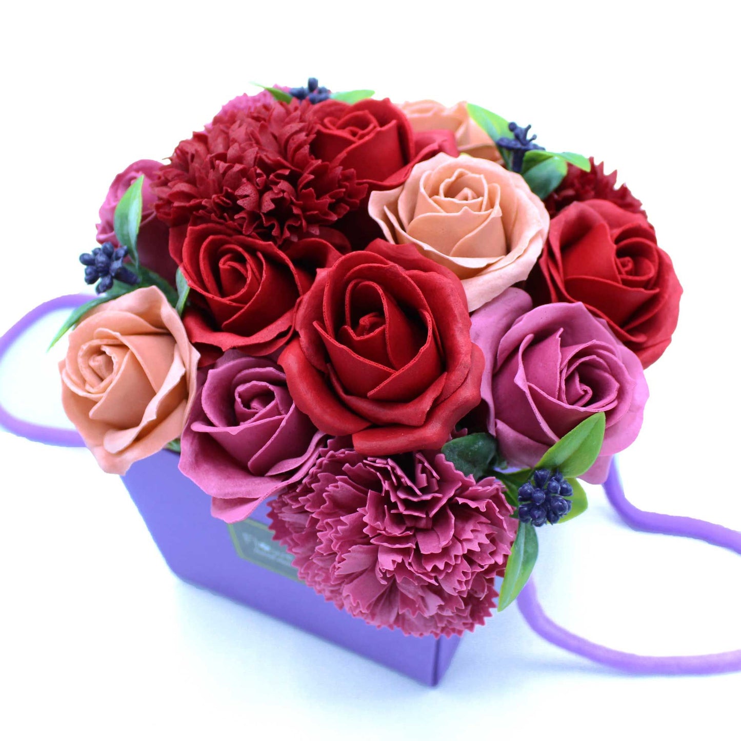 Purple Flower Garden soap flower bouquet with lifelike purple roses, lavender, hydrangeas and delicate blooms artistically arranged in elegant gift packaging with ribbon, presented as luxury bath gift