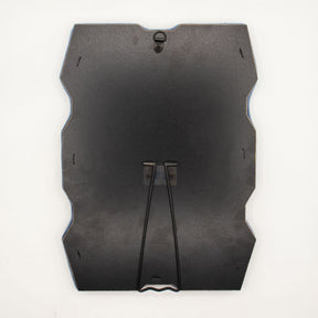 Detail of built-in stand on back of mirror for tabletop use, sturdy MDF construction visible
