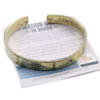 Hand-hammered brass galaxy cuff from Nepal with secret inner mantra (Dream Big, Reach For The Stars & more). Stars & Earth design outside. Fair-trade, adjustable, gift-ready with story card