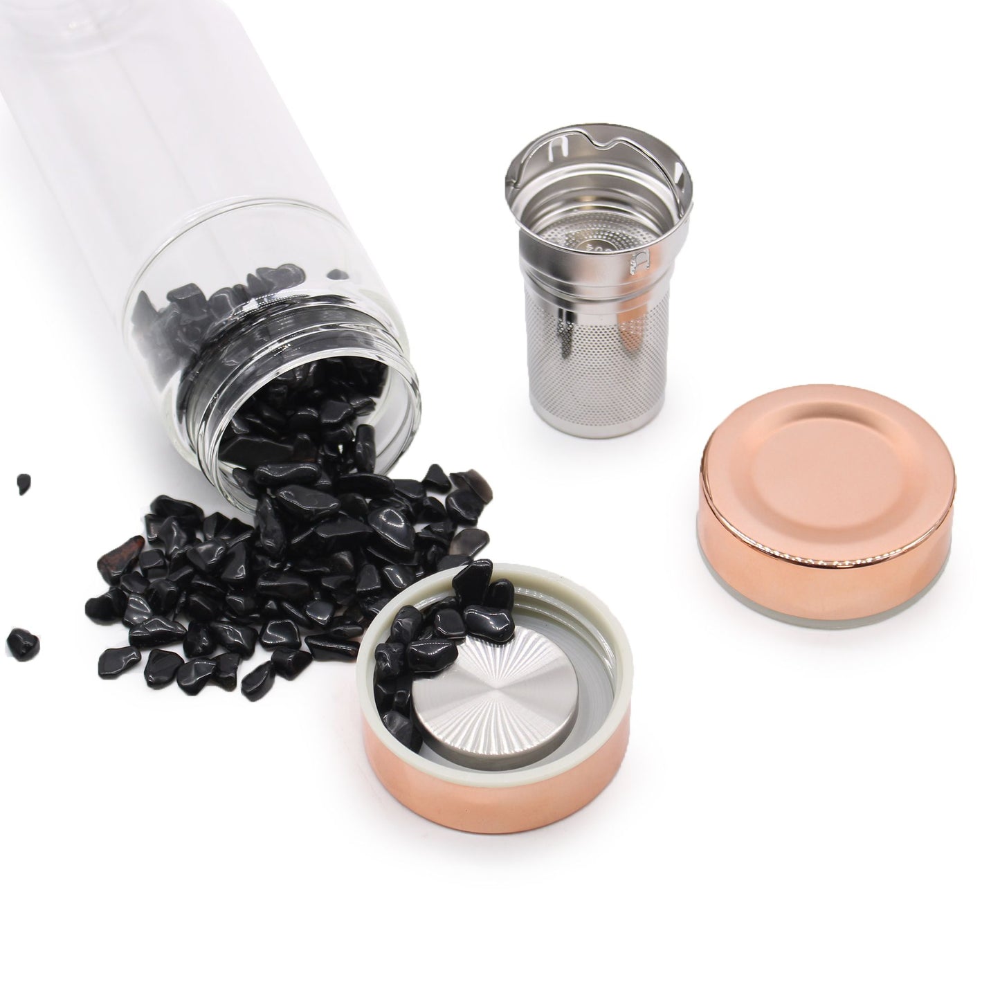 Rose gold amethyst crystal tea infuser bottle with removable bottom chamber full of purple amethyst chips, neoprene sleeve, loose leaf tea and steaming brew
