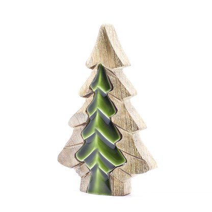 Decorative Christmas tree ornament with green ceramic top and wooden base on a white background