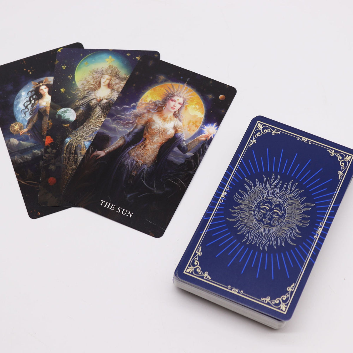 Goddess Arcana Tarot Deck fanned out with celestial goddess illustrations, guidebook and royal blue box