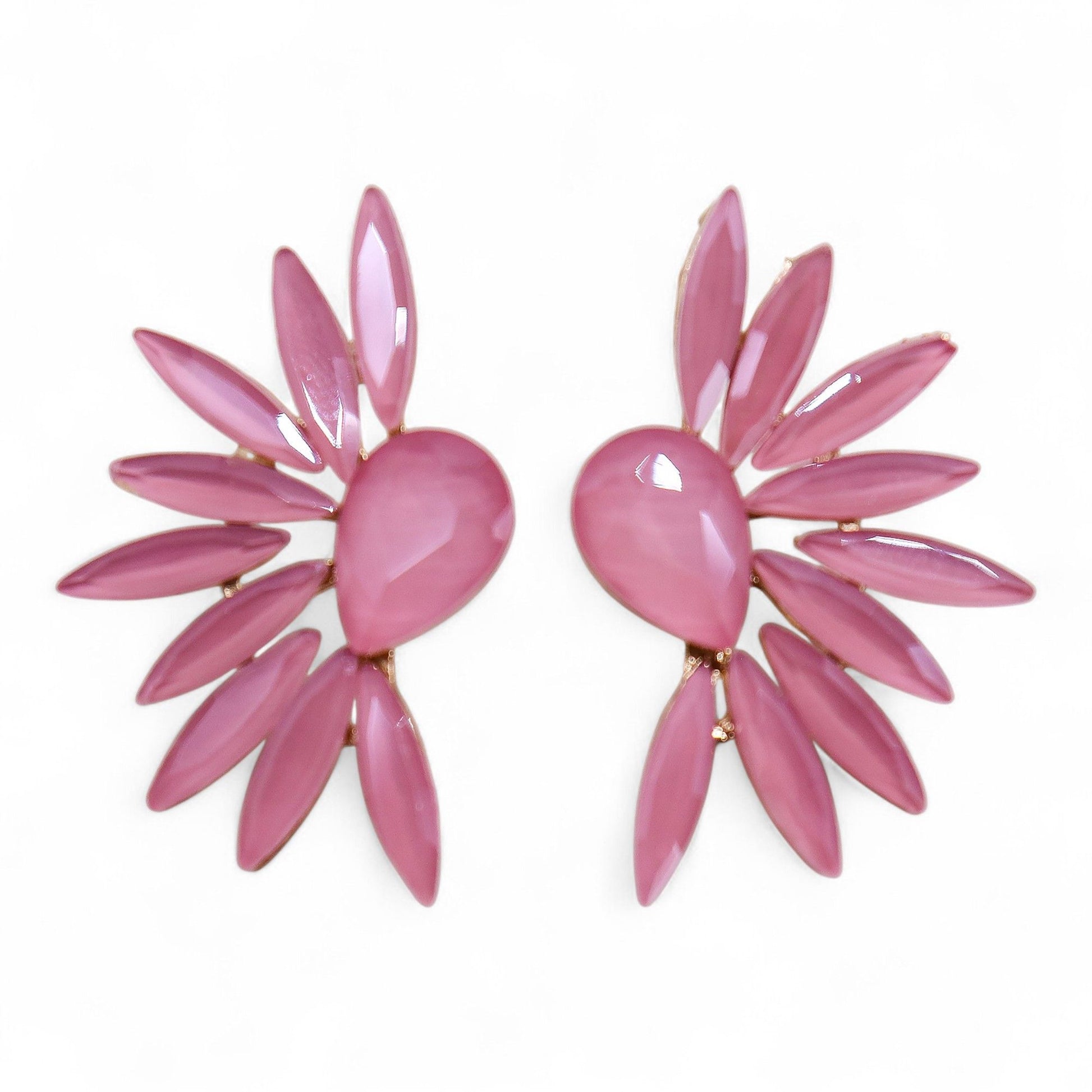 Soft pink vintage glass angel wing earrings catching gentle light, styled with rose petals and crystal-clear water droplets