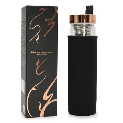 Rose gold amethyst crystal tea infuser bottle with removable bottom chamber full of purple amethyst chips, neoprene sleeve, loose leaf tea and steaming brew