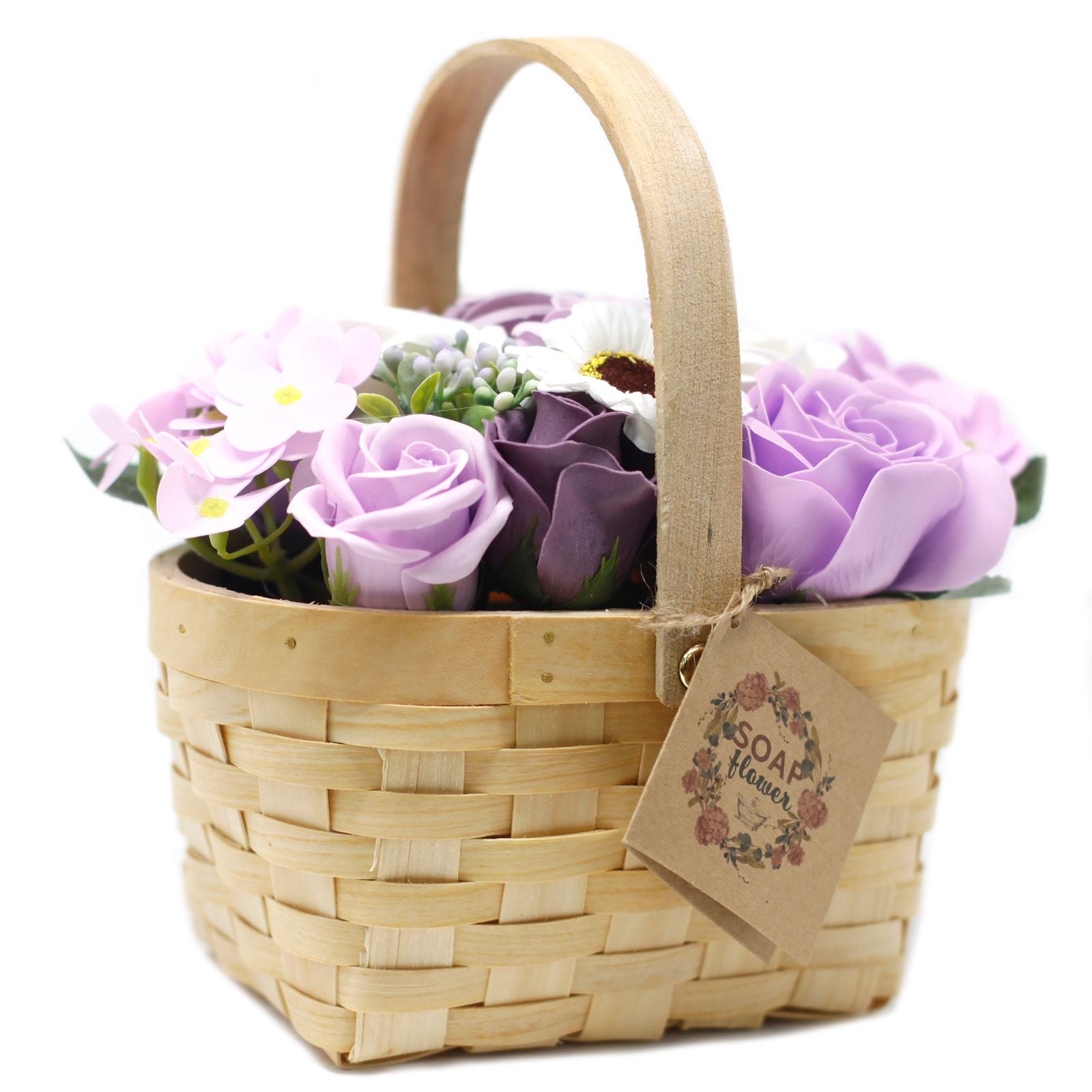 Large lilac soap flower bouquet with lifelike roses and blooms beautifully arranged in natural wicker basket, tied with ribbon, presented as luxury bath gift on soft white background