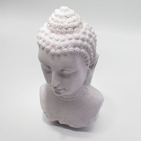 Buddha Bust Lamp with crackle textured surface on modern oval stand
