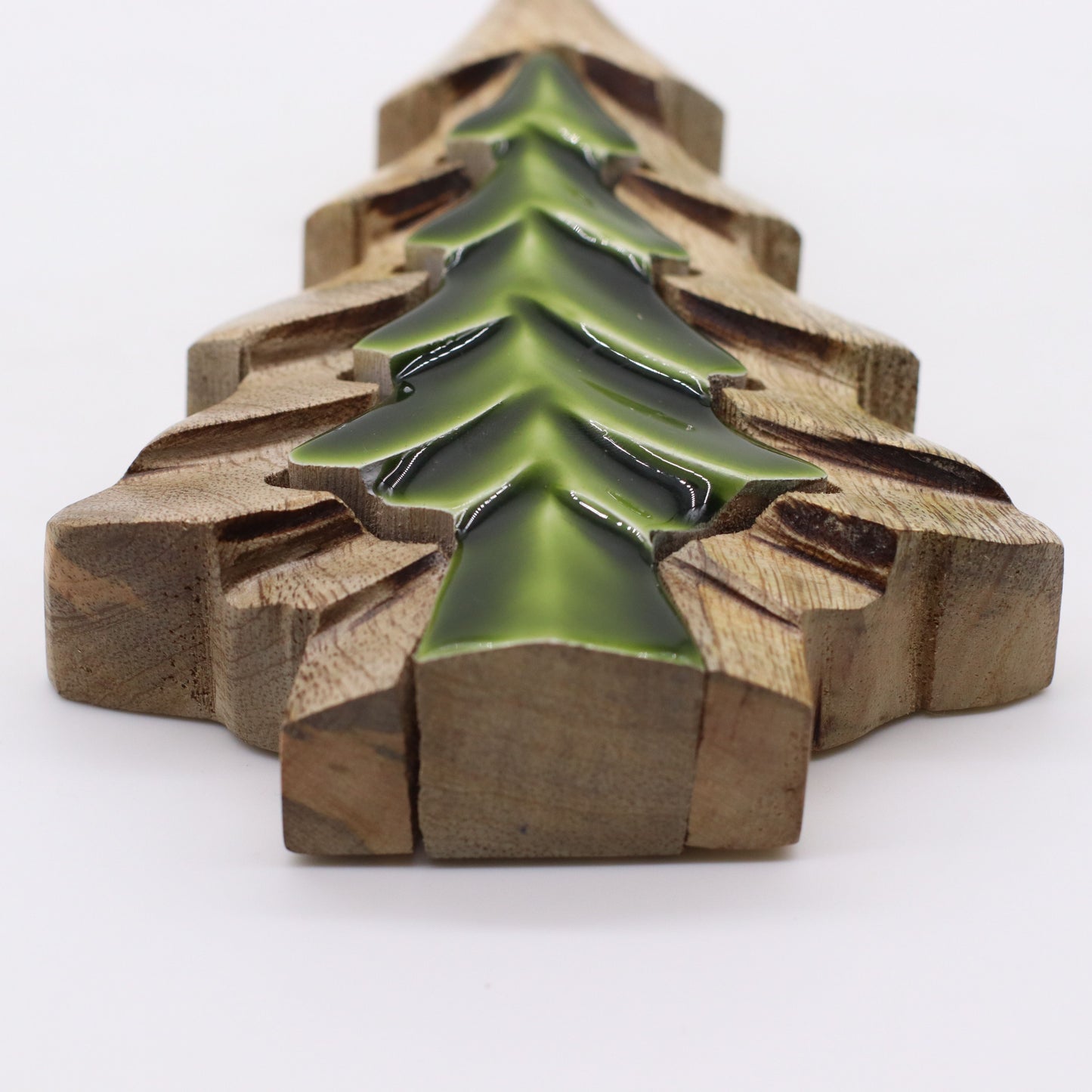 Decorative item with green tree design on wooden blocks
