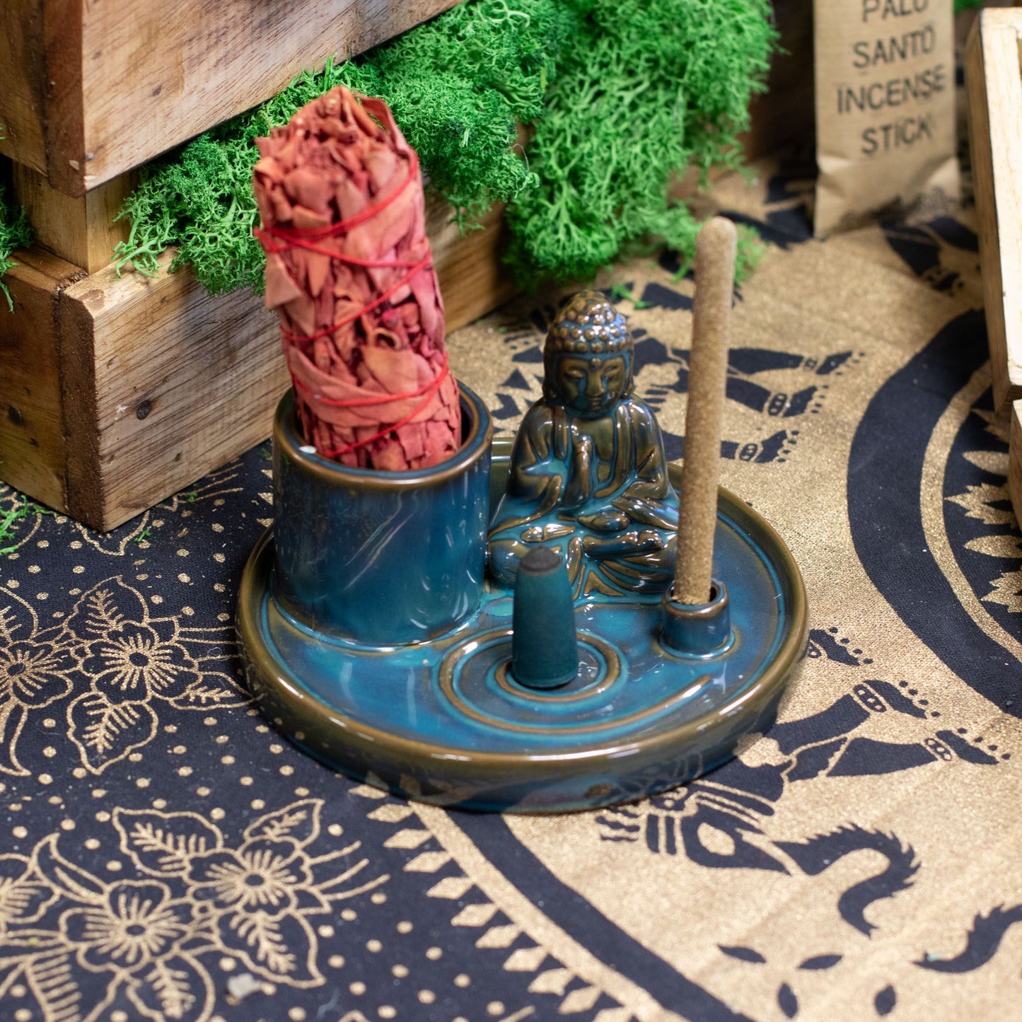 Deep blue ceramic Buddha incense plate with seated Buddha figure, integrated holders for incense sticks & cones