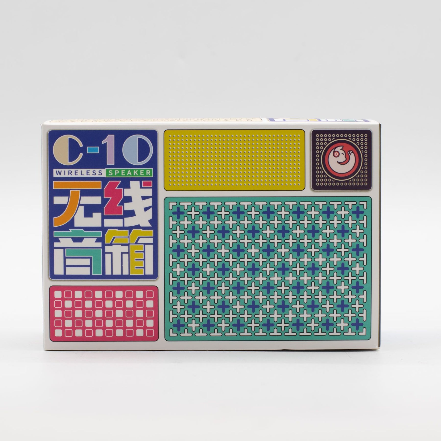 Colorful packaging of a wireless speaker with geometric patterns on a white background