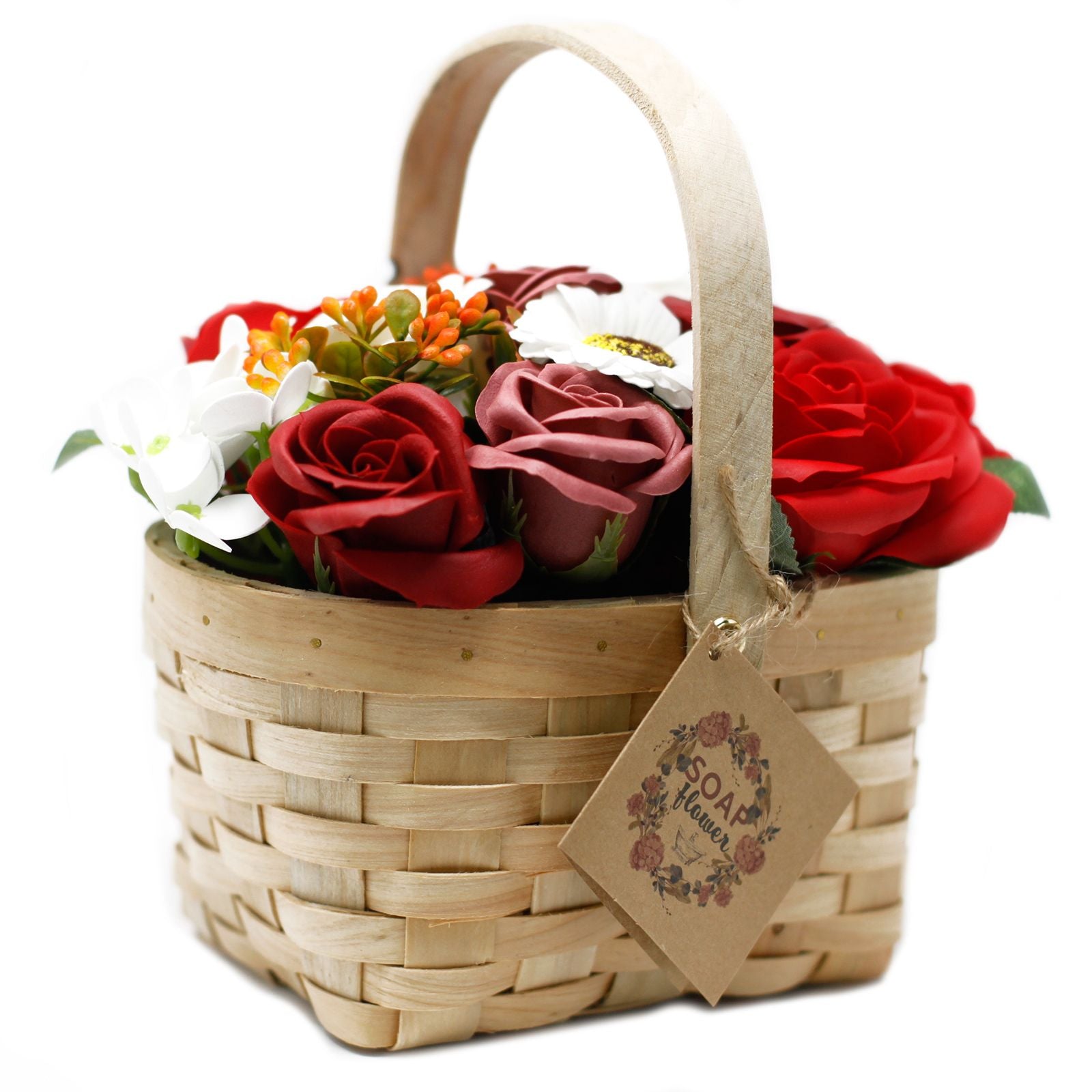 Large red soap flower bouquet with lifelike roses and blooms beautifully arranged in natural wicker basket, tied with ribbon, presented as luxury bath gift on soft white background