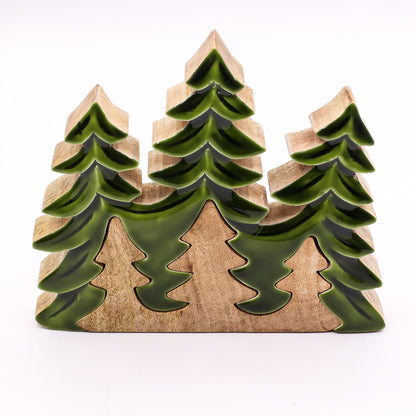 20×23cm 3D mango wood three pine trees decoration with deep green enamel branches on wooden base, styled on winter mantel with fairy lights and snow