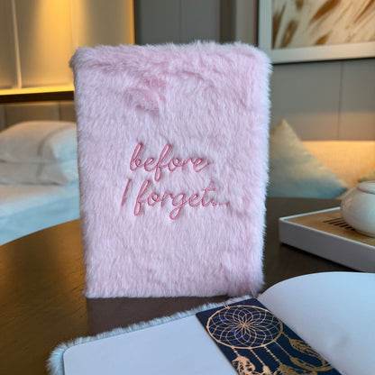 Pink fluffy notebook with 'before I forget...' text