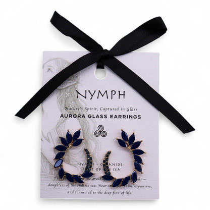 Aurora glass earrings on a Nymph branded card with a black ribbon