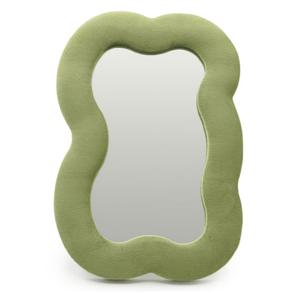 Soft squiggly large cloud mirror in earthy moss green velvet frame with organic curved silhouette