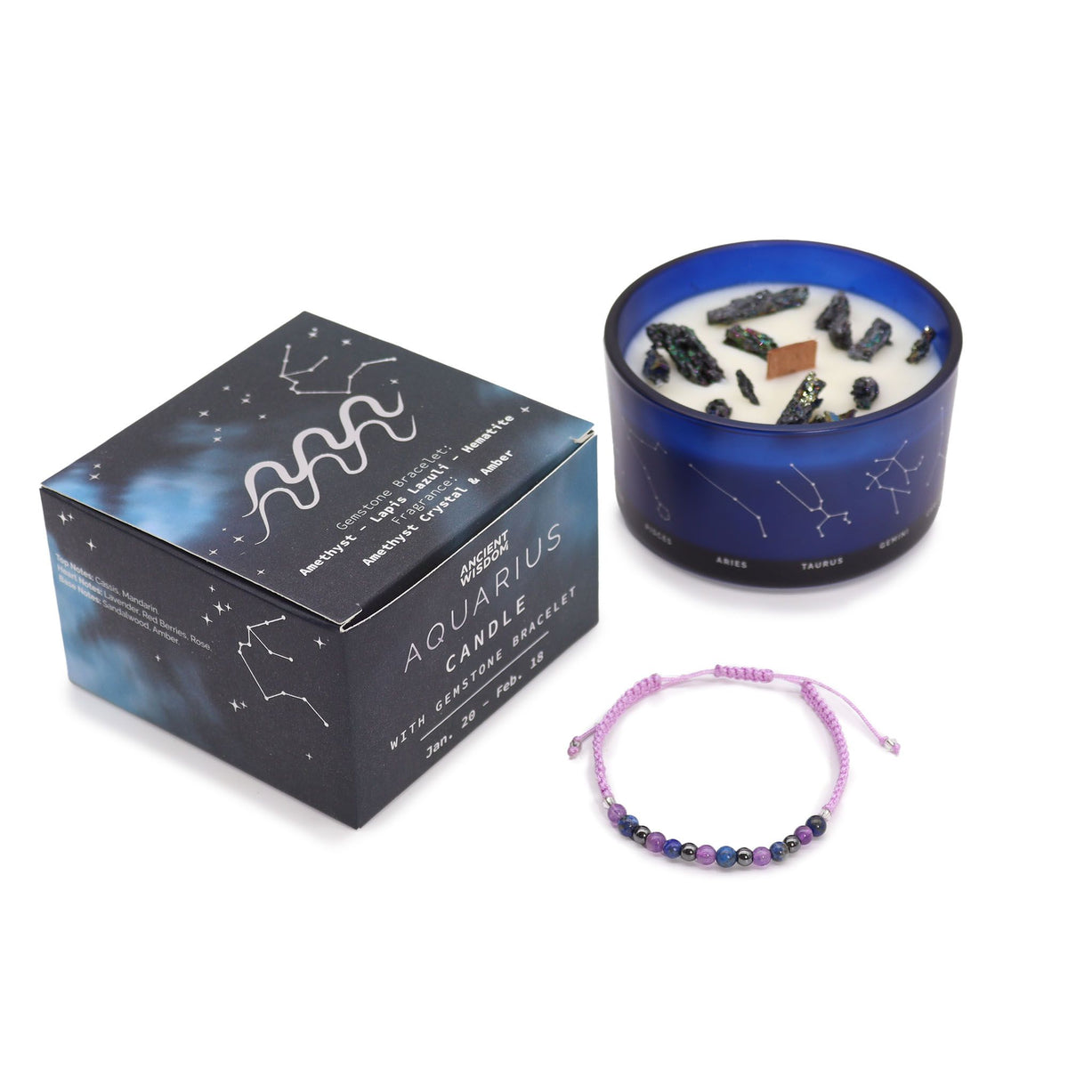 Indigo Aquarius zodiac candle burning beside matching amethyst, lapis lazuli & hematite bracelet
