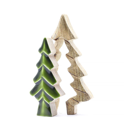 Two ceramic Christmas tree ornaments on a white background