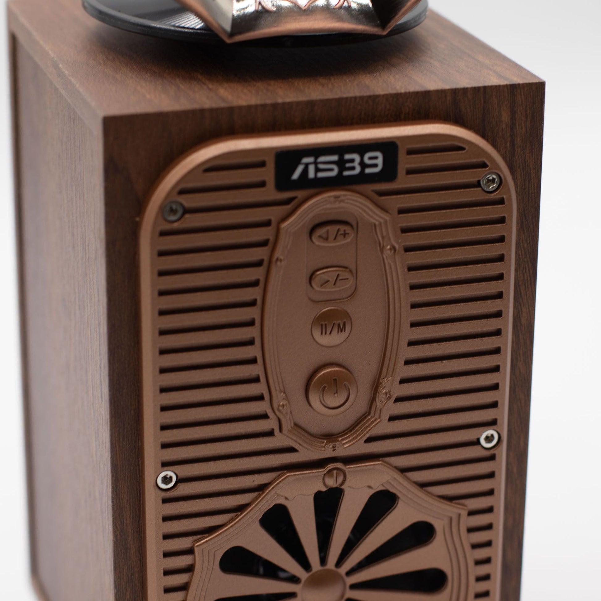 Close-up of retro gramophone speaker showing flared horn detail, front controls (volume, mode, power) and 8W speaker grille