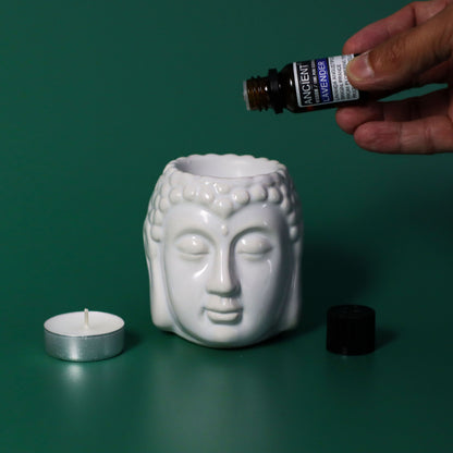 10ml amber glass bottle of pure Lavender Essential Oil with black dropper cap, fresh lavender sprigs