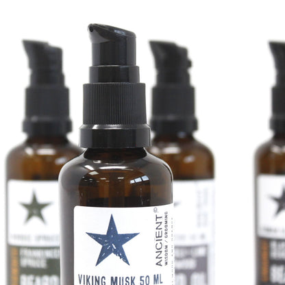 Bottle of Viking Musk 50 ML with star design on label, surrounded by similar bottles.