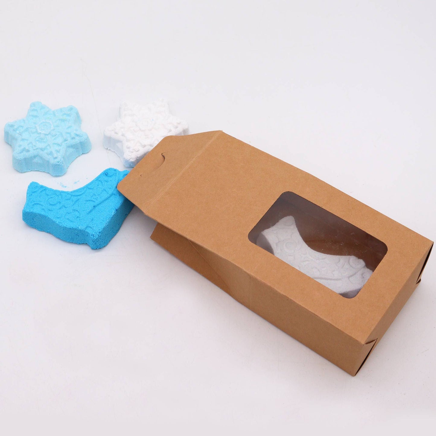 Break the Ice Christmas bath bomb gift pack with white snowflake and blue ice skate bath bombs in festive kraft box