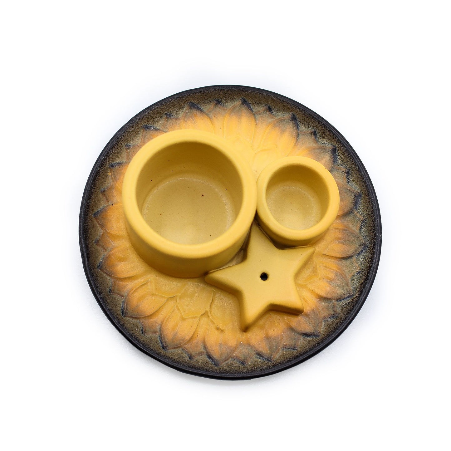 Yellow ceramic incense holder with star design