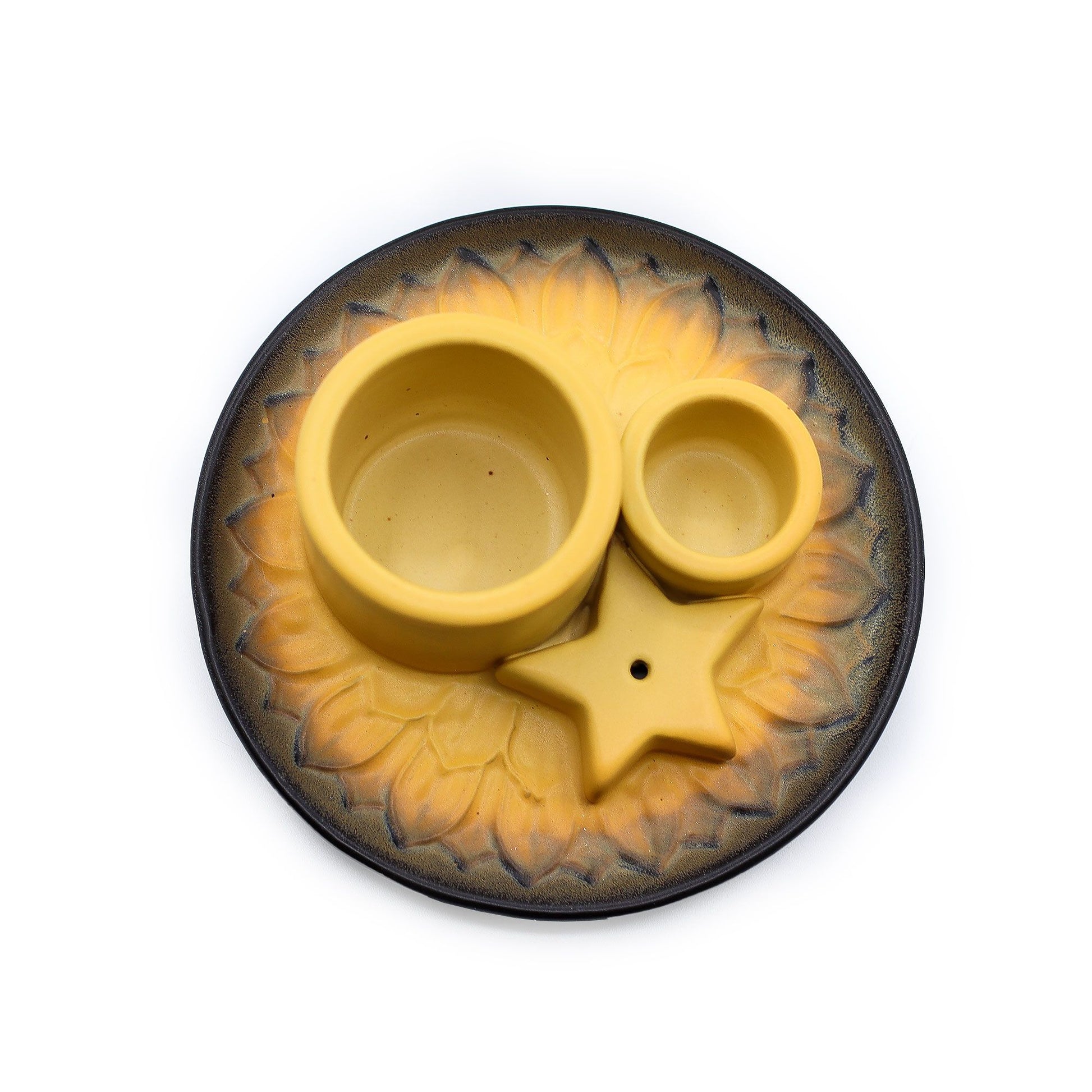 Yellow ceramic incense holder with star design