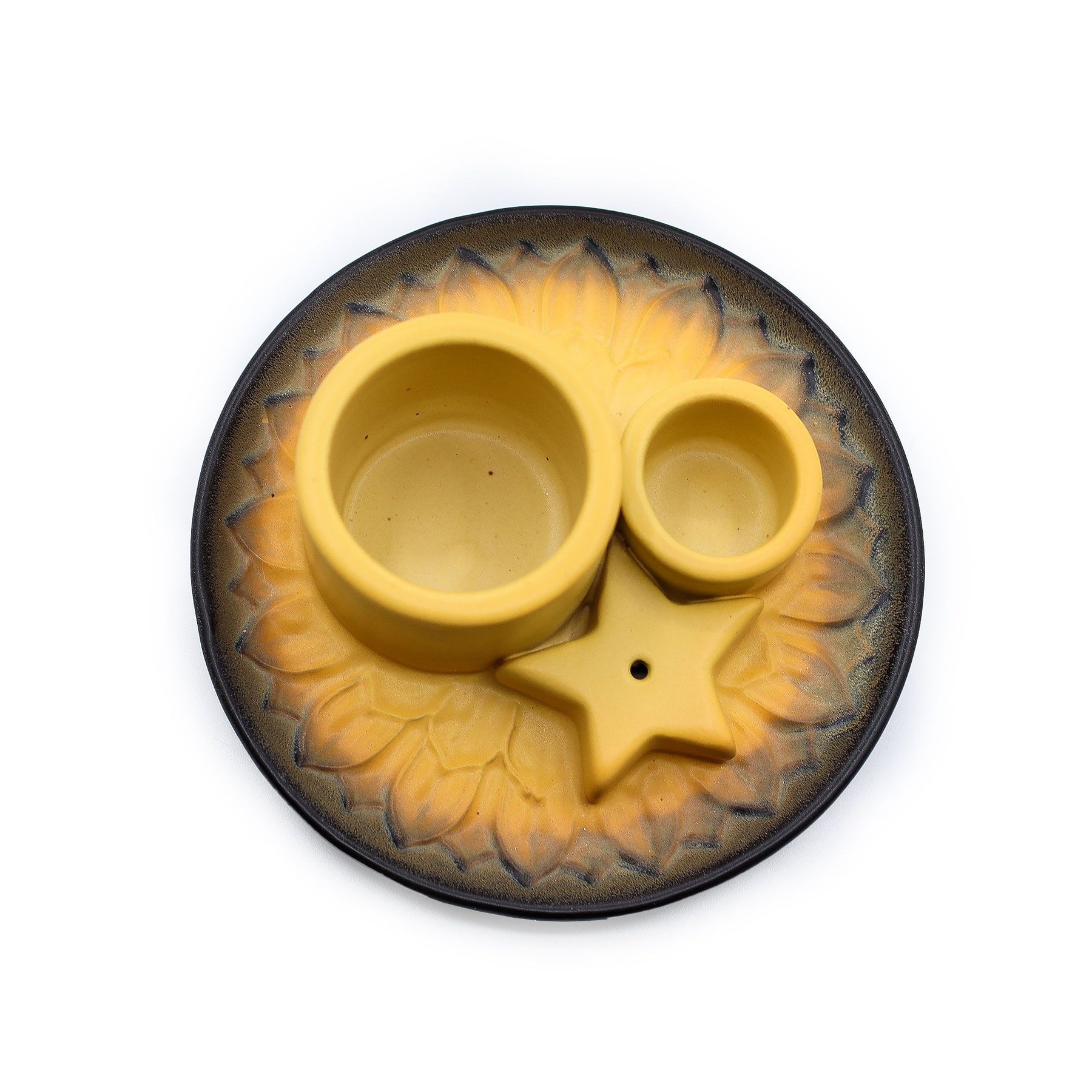 Yellow ceramic incense holder with star design