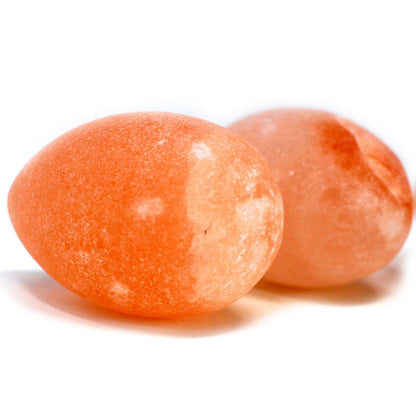 Himalayan Egg Deodorant Stone displayed on wooden tray with fresh herbs and natural linen, evoking pure, eco-conscious wellness