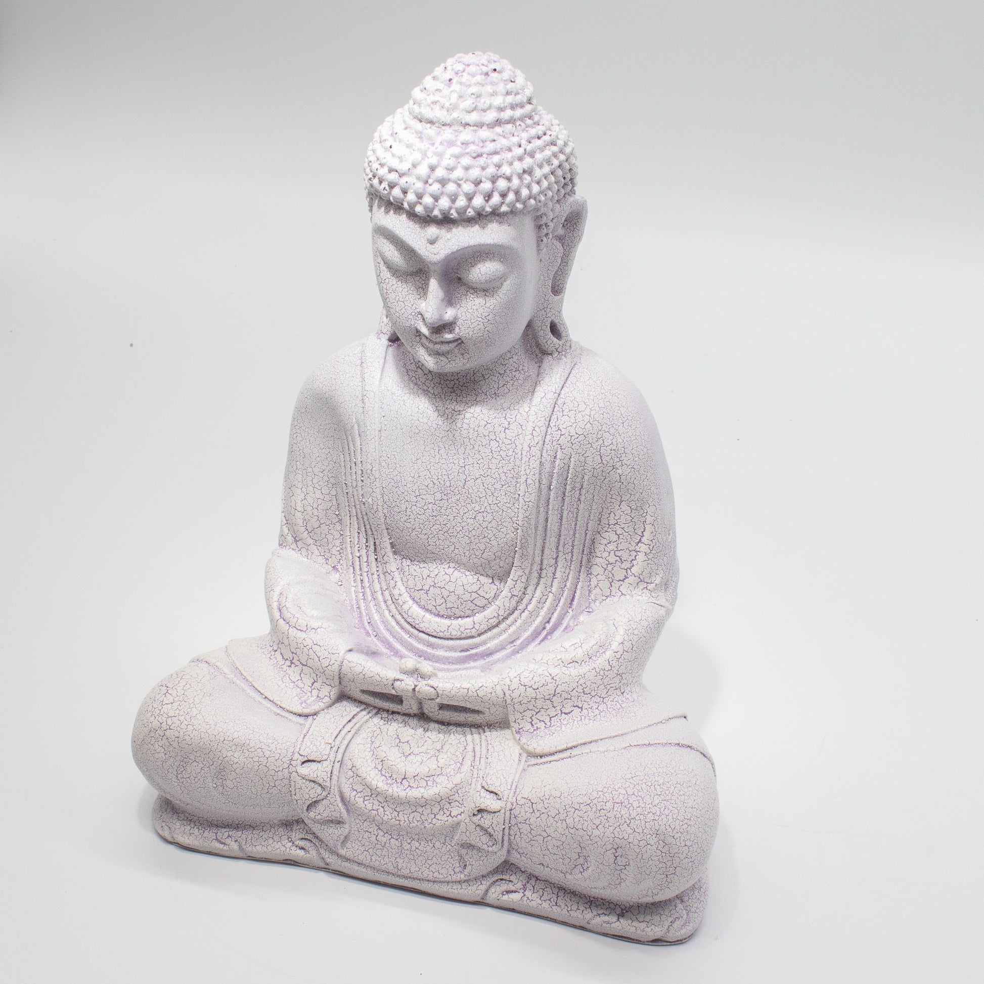 Meditation Buddha Lamp with crackle textured surface on modern oval stand