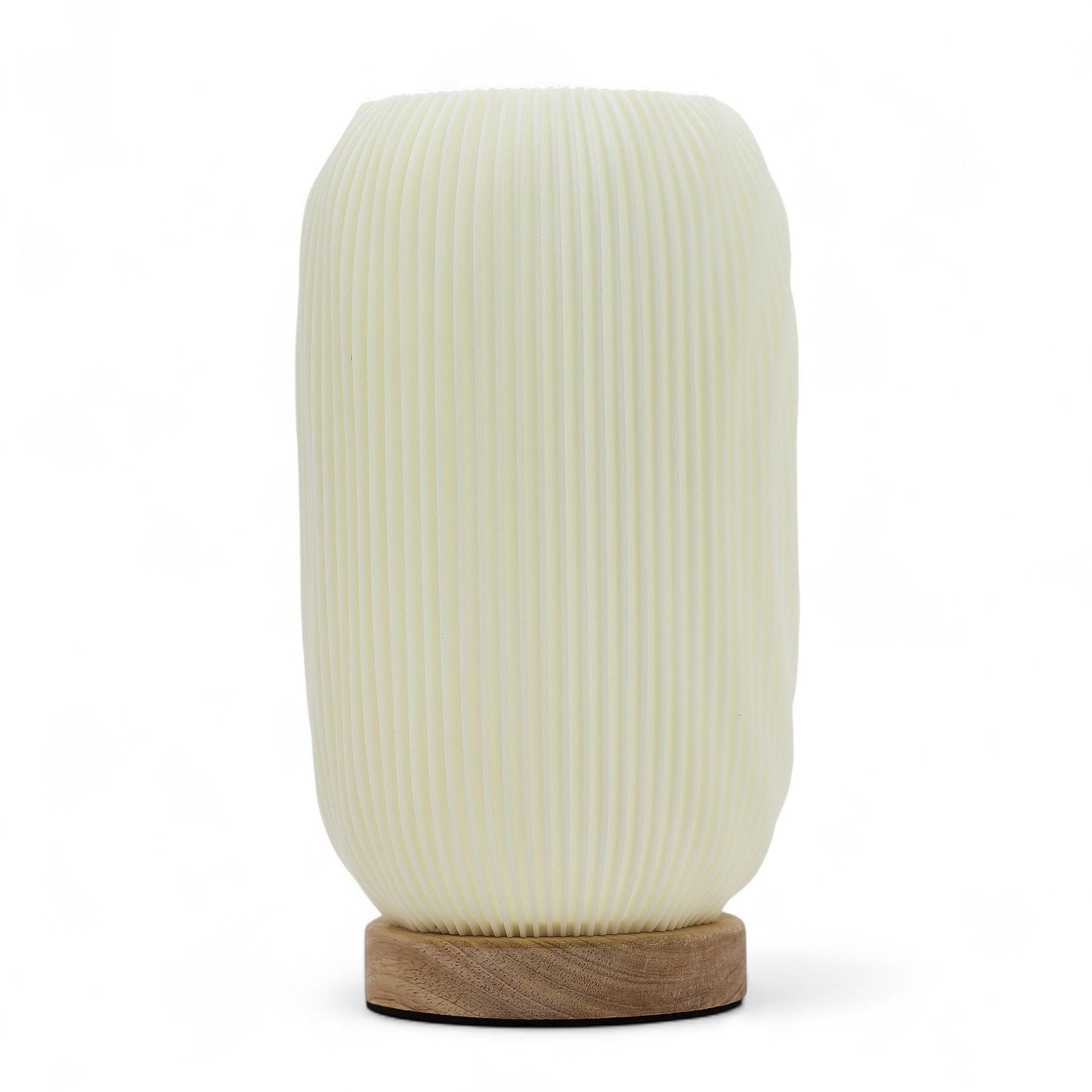 Modern Twisted New Wave USB lamp with textured honeycomb surface and sleek twisted silhouette, warm glow on 3rd brightness setting, placed on wooden base