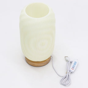 USB cable connected to laptop or power bank, highlighting convenient portable power source