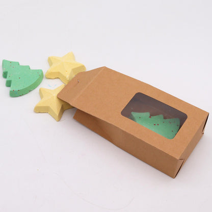 Silent Night Christmas bath bomb gift set with 2 green tree bath bombs and 2 gold star bath bombs in festive kraft gift box with ribbon