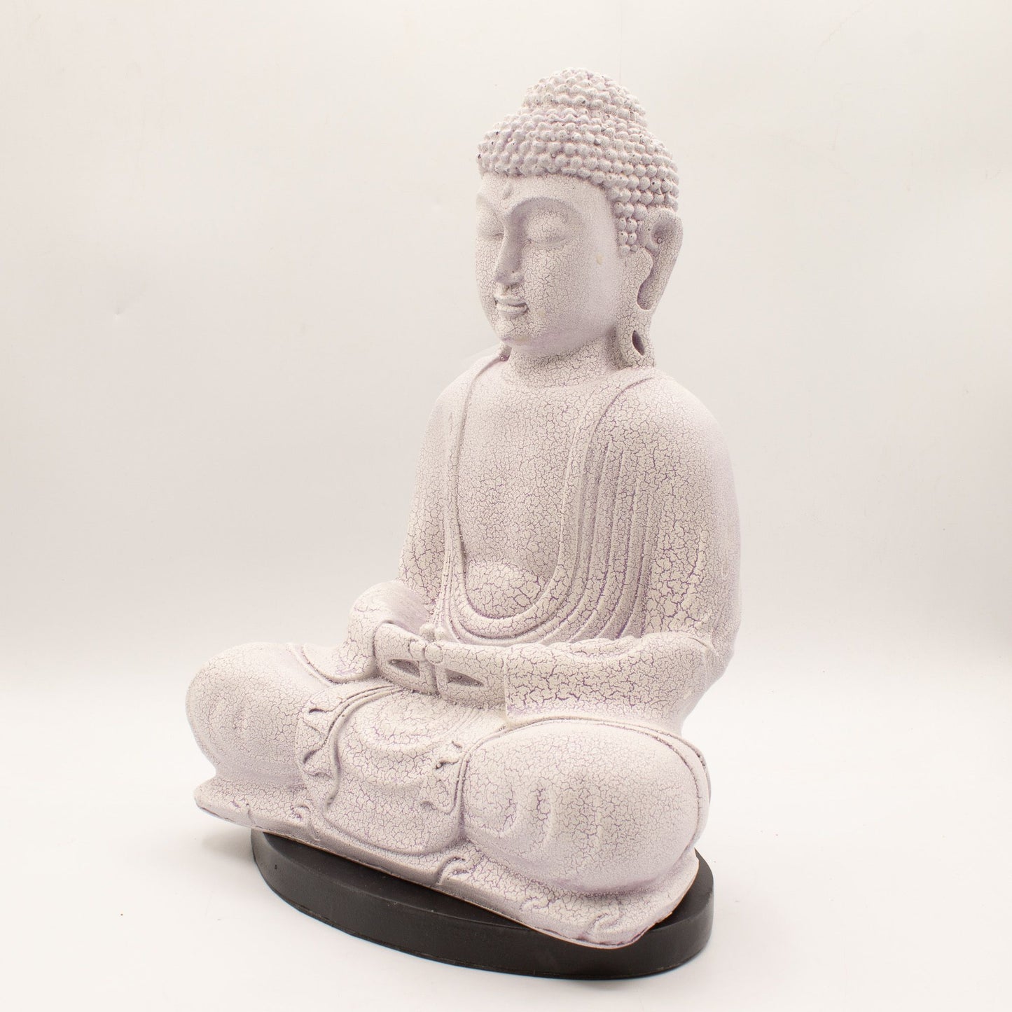 Meditation Buddha Lamp with crackle textured surface on modern oval stand