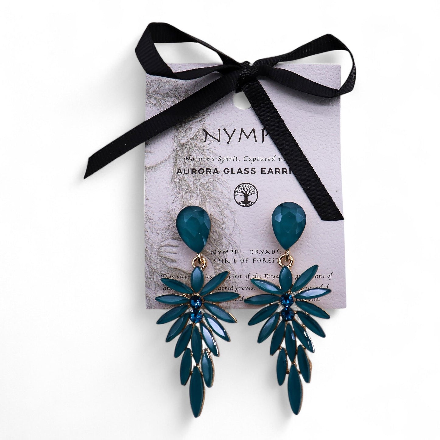 Teal earrings on a Nymph branded card with a black ribbon
