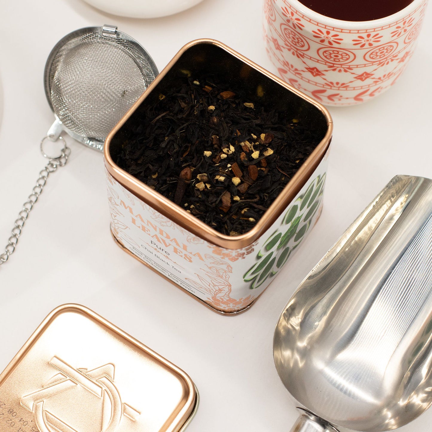 50g tin of organic chai black tea with loose leaves, ginger, cinnamon sticks, cardamom pods & black peppercorns