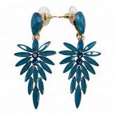 Teal green vintage glass long drop earrings swaying gently