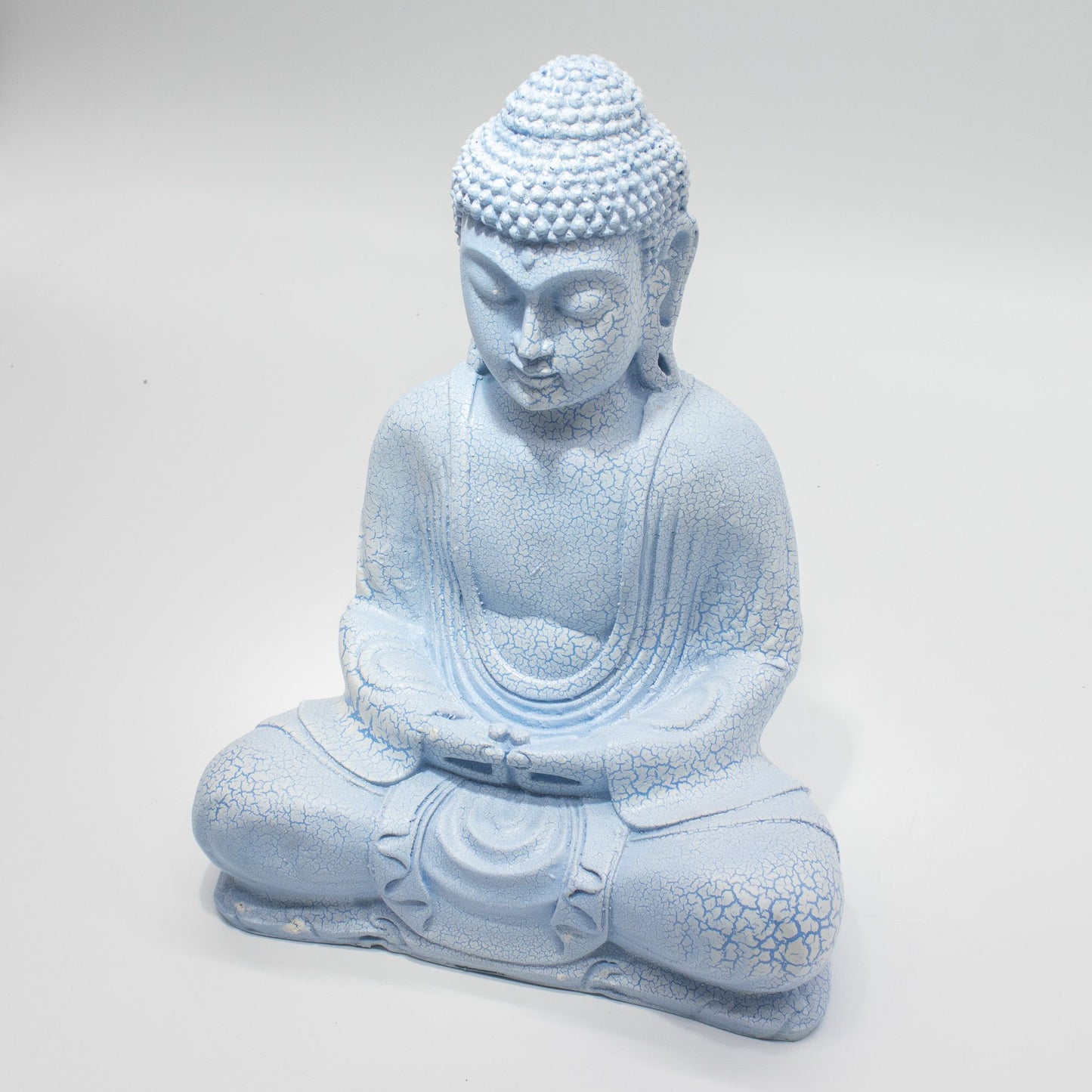 Meditation Buddha Lamp with crackle textured surface on modern oval stand