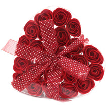 Set of 24 luxury soap red roses beautifully arranged in large heart-shaped gift box, realistic petal details in soft romantic colours, ready for bath or decorative display