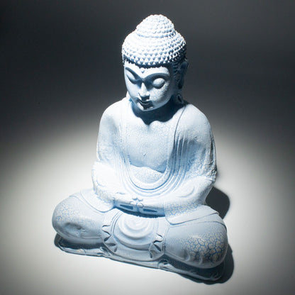 Meditation Buddha Lamp with crackle textured surface on modern oval stand