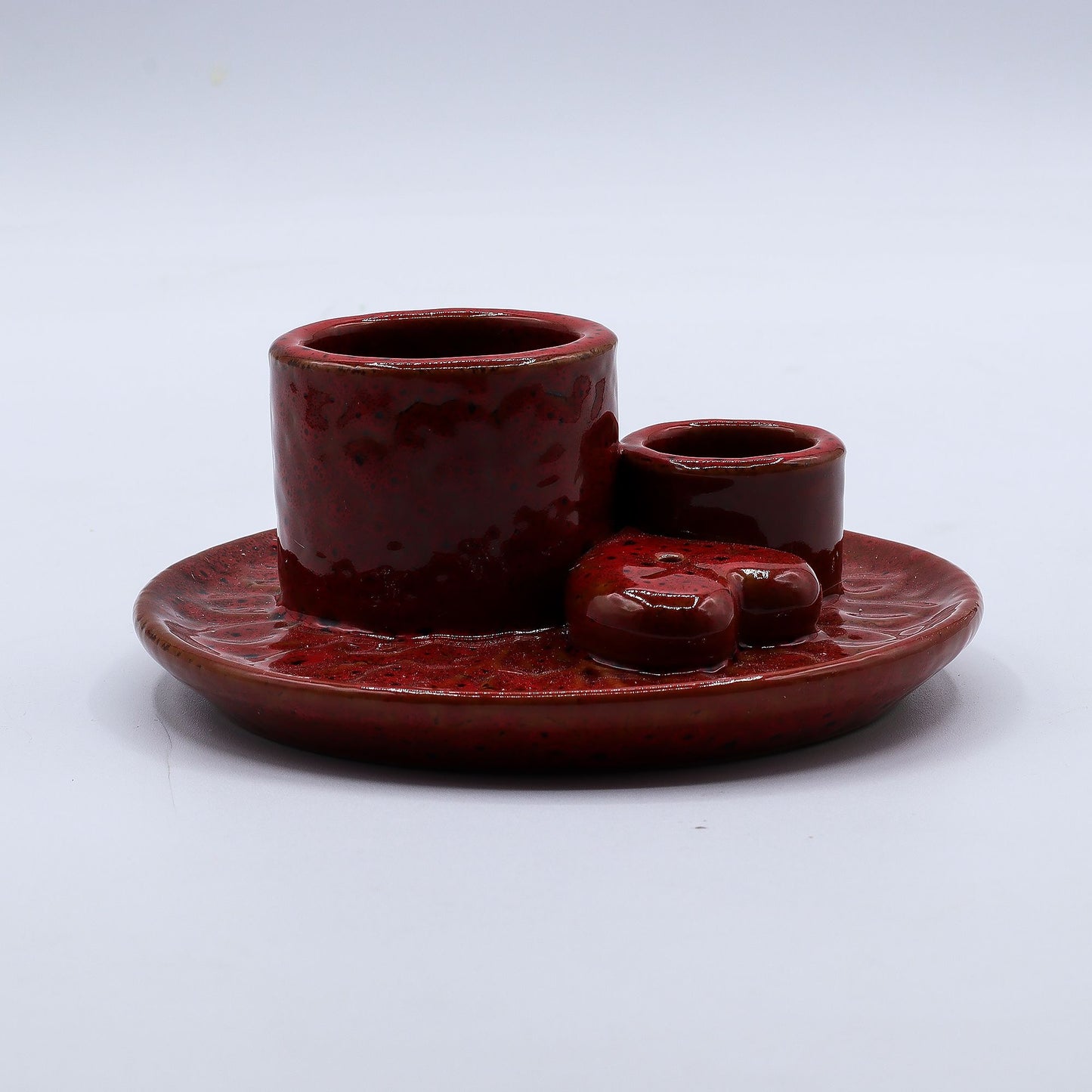 Red ceramic incense holder
